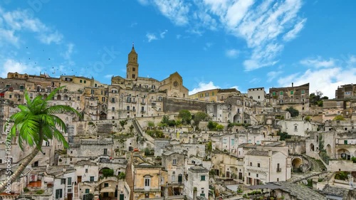 Medieval Town Of Matera Atop Rocky Outcrop In The Region of Basilicata, Southern Italy. Sassi di matera old town, panoramic view of typical stones and church of Matera. Aerial view from the old town 
