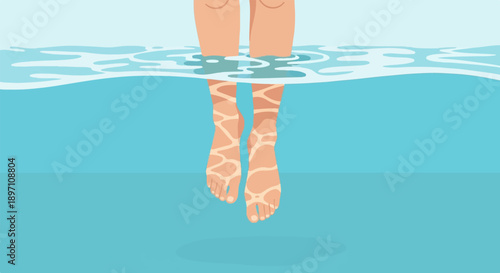 Legs submerged in turquoise water, with sunlight patterns on skin