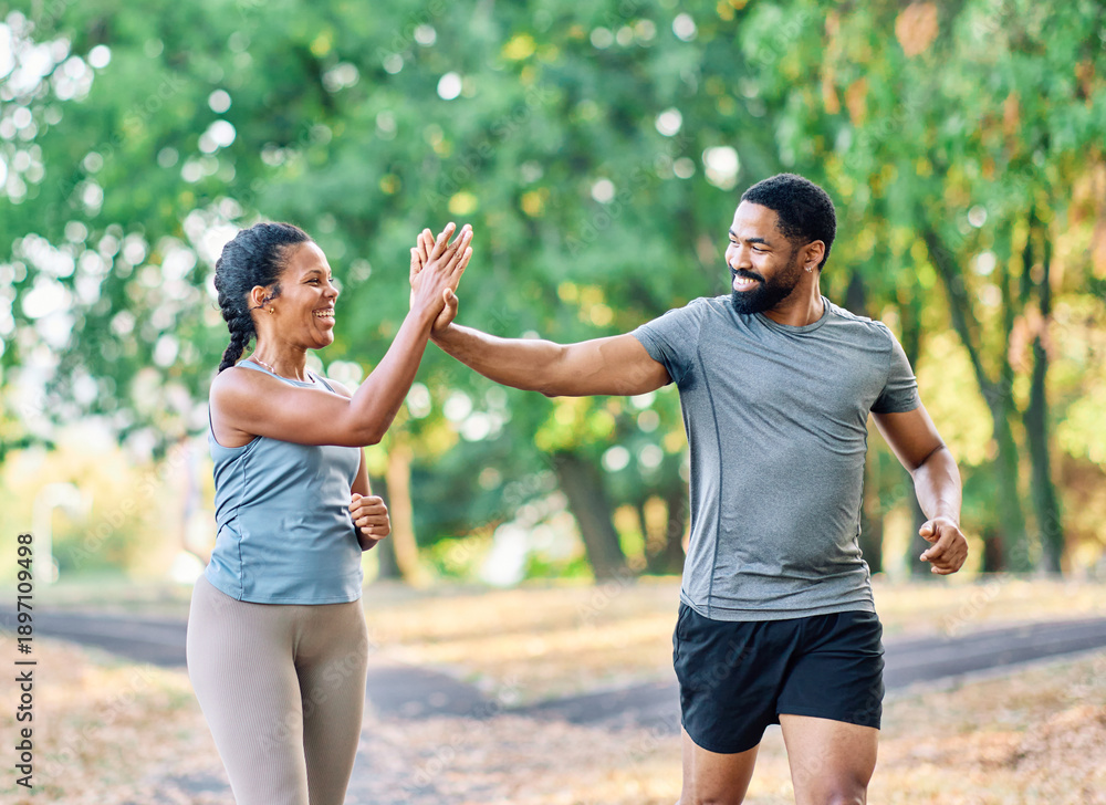 Obraz premium Couple jogging and running in a park healthy lifestyle