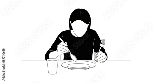 Person wearing face mask eating meal with fork and knife.