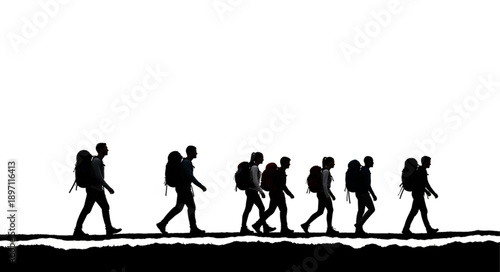 Silhouettes of hikers with backpacks walking in a line.