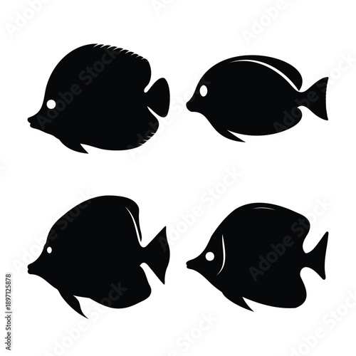 Collection of four black tropical fish silhouettes with white eyes on white background