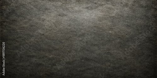 A dark and aged grunge texture displays a rough, black stone wall surface with vintage grey concrete patterns and a dirty, blank backdrop of textured metal and paint