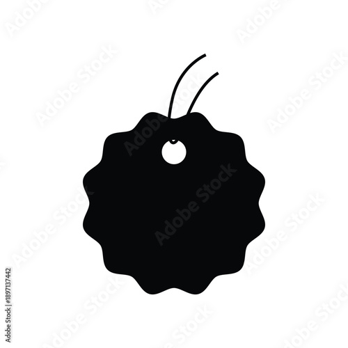 A black silhouette of a flower or apple with a hole and two stems on a white background