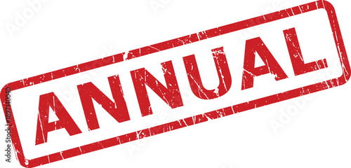 A vibrant red rectangular grunge rubber stamp with the word ANNUAL written clearly on a white surface