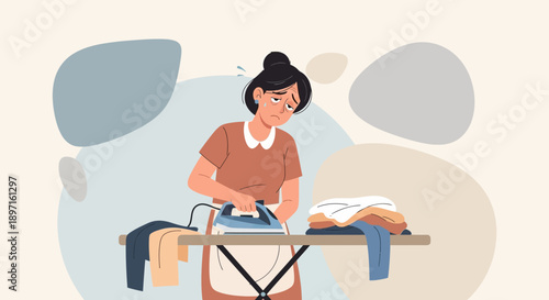 Woman ironing clothes with focus and determination.