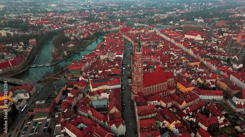 Aerial view of Landshut old town in Bayern Germany featuring Saint Martin Church tower. Historic Gothic architecture and red roofs of the Stiftsbasilika St Martin in the city center of Lower Bavaria
