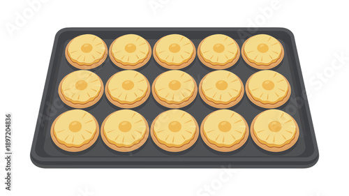 Freshly baked cookies on baking tray.