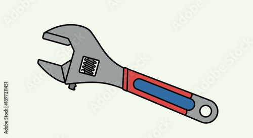 Adjustable wrench in use during construction project on a workbench in a workshop environment from a close-up viewpoint