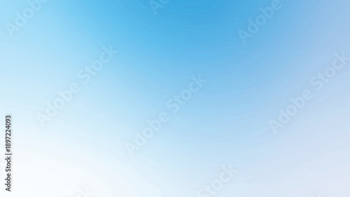 Abstract blue sky background with soft white clouds and bright sunlight