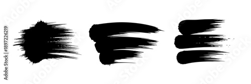 Brush stroke ink splashes with dynamic, textured lines in black, resembling abstract calligraphy or expressive painting marks, emphasizing movement and artistic expression