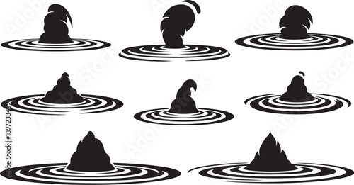 Black silhouettes of stones in rippling water on white