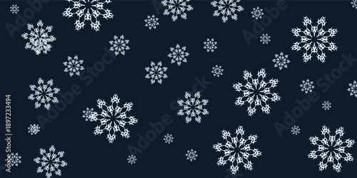 Elegant Snowflakes Falling on a Dark Blue Winter Background.