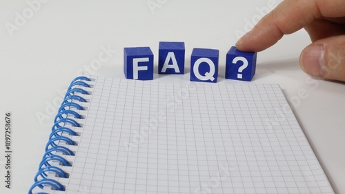 Fotografía FAQ written on wooden cubes, Frequently Asked Questions, abbreviated to FAQ