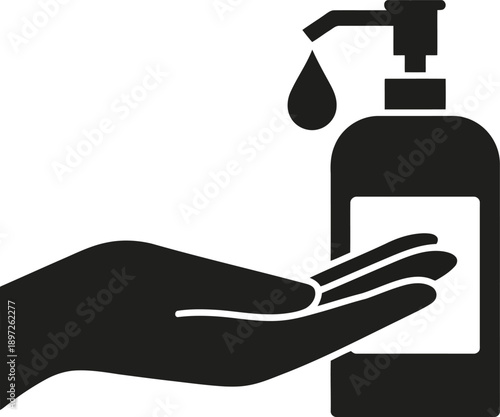 Hand using hand sanitizer dispenser with flowing liquid