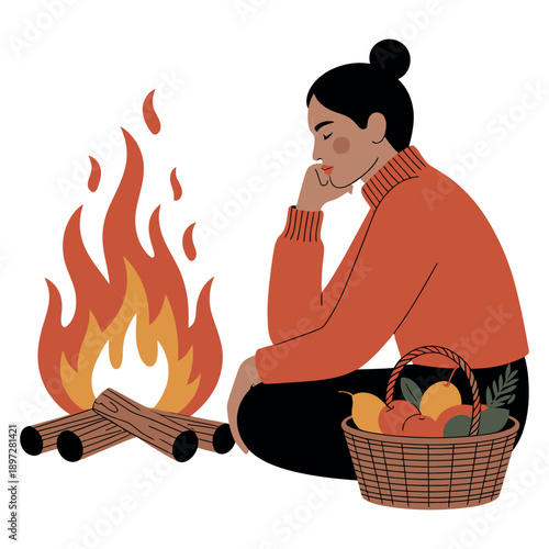 Woman sitting by a warm bonfire with a basket of fresh fruits creating a cozy and relaxing outdoor autumn scene