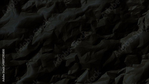 Closeup of crumpled black paper texture surface