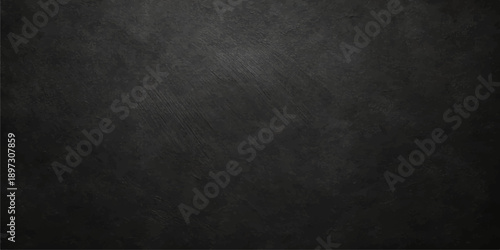 Dark grunge paper texture and old black and white concrete wall backdrop featuring a rough vintage stone surface and a blank dirty charcoal board pattern for a textured gray design