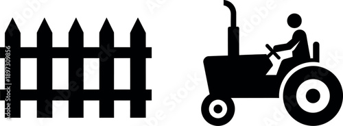 Farmer driving tractor near fence