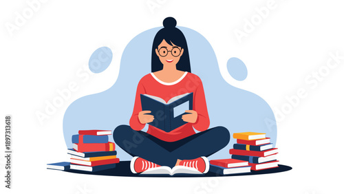 Young woman wearing glasses sits on the floor immersed in reading a book while surrounded by several large stacks of books.