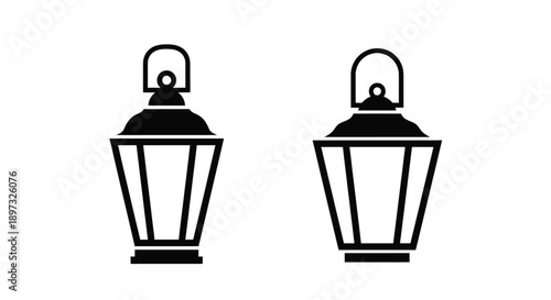 Two vintage kerosene lamps in black and white a striking silhouette