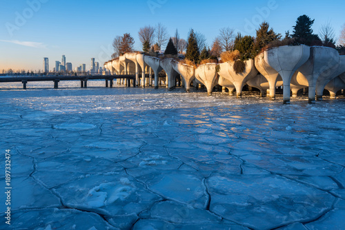 Little Island at Hudson River Park, New York City, with frozen, ice-covered river during extreme winter cold