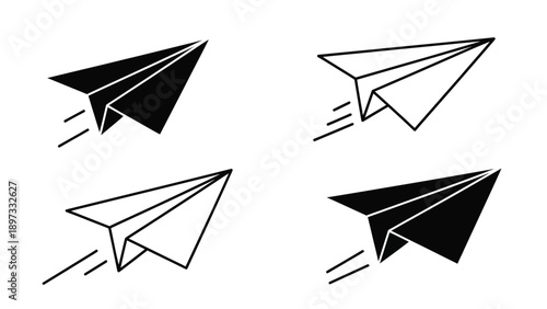 Four paper airplanes in flight a minimalist black and white silhouette