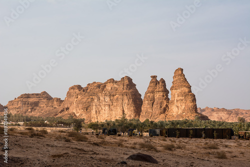 Mountains shaped by erosion in the Al Ula desert of Saudi Arabia featuring dramatic rock formations natural geology and arid landscape