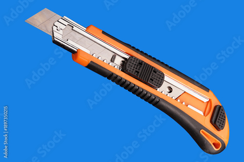 utility knife with retractable blade on a blue background