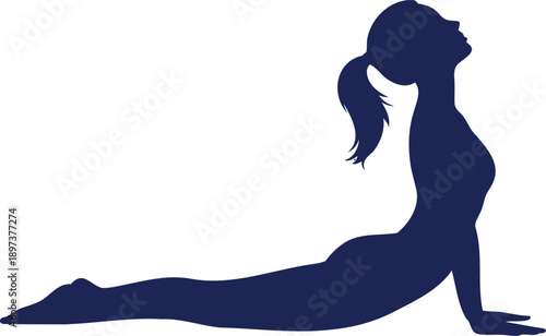 Dark blue silhouette of a woman in yoga cobra pose