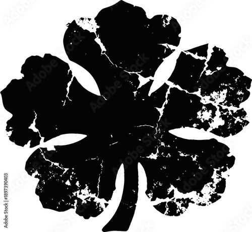 worn black silhouette of a four leaf clover with distressed texture and weathered appearance