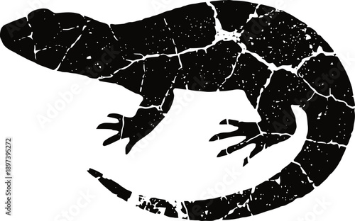 Black silhouette of a cracked lizard with long tail and clawed feet isolated on white background