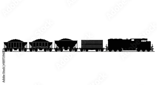 Freight train transporting coal and cargo through industrial landscape