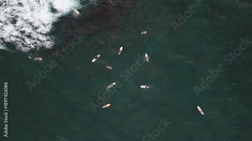 Drone Shot of Surfers Near Beachfront Villa at Sunset in Sri Lanka