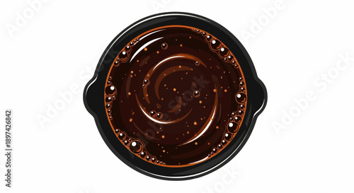 Dark rich hot beverage swirls with a foamy textured rim