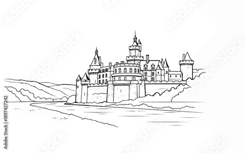 Ornate, multi-turreted castle perched on a rocky hill overlooking a winding river and rolling countryside