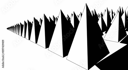 A monochromatic, low-angle perspective of an endless, receding line of sharp, triangular shapes