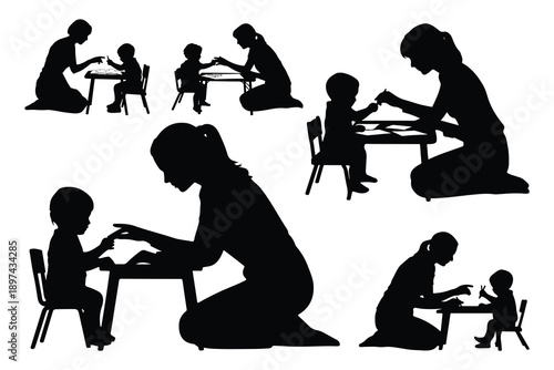 Woman and child at tables learning and playing silhouette