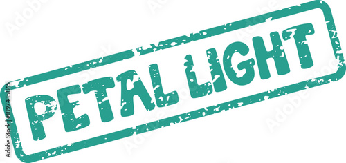 Distressed green rubber stamp impression featuring the positive words Petal Light for design projects