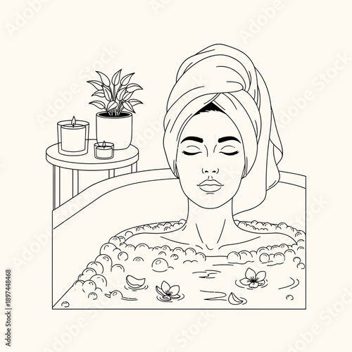 Woman relaxing in a bathtub with a towel on her head.