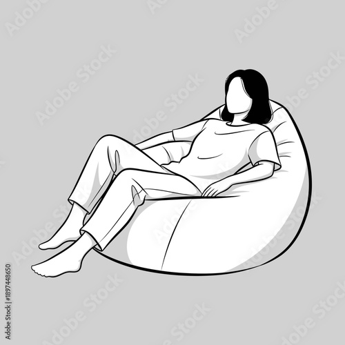Woman relaxing on a beanbag chair enjoying leisure time.