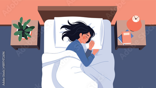 Top view of a young woman sleeping peacefully in her bed with a white blanket, a green plant on one nightstand, and a lamp on the other.