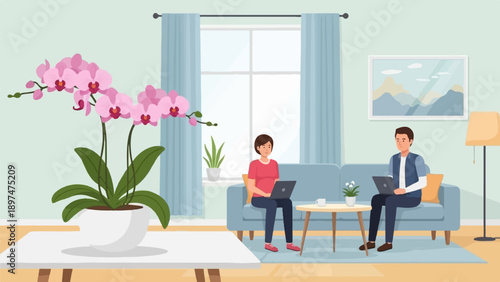 Two people work on laptops in a living room with a potted orchid and a landscape painting