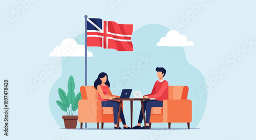 Two people working on laptops in chairs with a flag