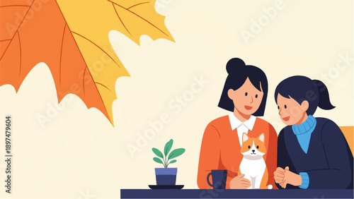 Two women and a cat share a cozy moment near a large autumn leaf