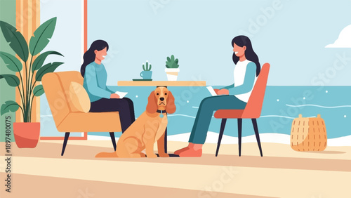 Two women and a dog sit at a table by the ocean