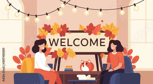 Two women and a dog sit in armchairs under festive lights