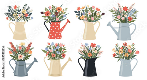 Creative collection of eight diverse watering cans in various colors and styles used as vases for beautiful floral bouquets.