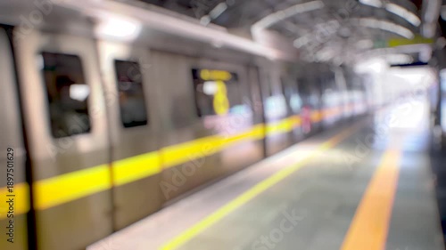 Delhi metro train arriving at station, metro train in India