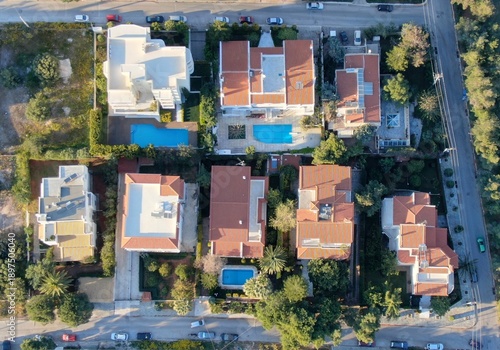 Aerial view of luxury villas with swimming pools in Ano Glyfada, Athens Riviera